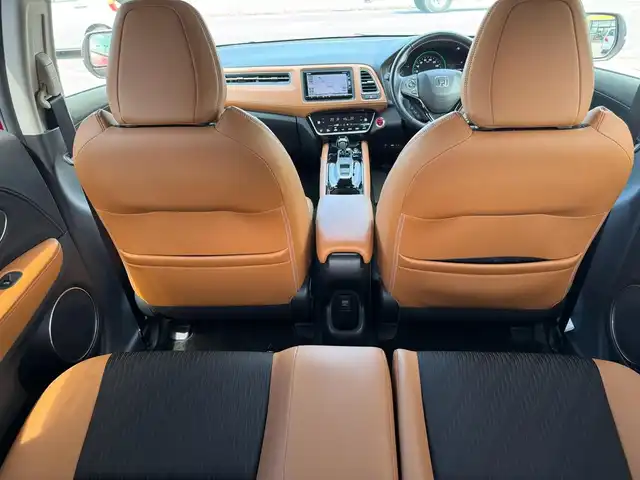 ホンダ ヴェゼル ハイブリッド Z ホンダセンシング 滋賀県 2018(平30)年 5.2万km プレミアムクリスタルレッドM ワンオーナー/純正フルセグナビ/　フルセグ Bluetooth CD DVD FM AM SD/バックカメラ/純正ドライブレコーダー/Honda SENSING/衝突軽減ブレーキ〈CMBS〉/誤発進抑制機能/歩行者事故低減ステアリング/路外逸脱抑制機能/ACC〈アダプティブ・クルーズ・コントロール〉/LKAS〈車線維持支援システム〉/先行車発進お知らせ機能/標識認識機能/コンフォートビューパッケージ/親水/ヒーテッドドアミラー/フロントドア撥水ガラス/熱線入りフロントウインドウ/純正LEDヘッドライト/純正LEDフォグランプ/純正17インチアルミ/運転席＆助手席シートヒーター/ルーフレール/コンビシート/スマートキー×2/プッシュスタート/