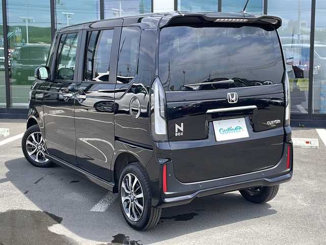 ホンダ Ｎ ＢＯＸ カスタム 道東・釧路十勝 2024(令6)年 1.1万km クリスタルブラックパール ・4WD/・社外SDナビ/（SD・FM・AM・AUX・BT・SMART USEN・DISC）/・バックカメラ/・ホンダセンシング/・レーダークルーズコントロール/・レーンキープアシスト/・コーナーセンサー/・片側パワースライドドア/・前席シートヒーター/・ミラーヒーター/・ETC/・電子制御パーキング/・ステアリングスイッチ/・LEDヘッドライト/・オートライト/・ヘッドライトレベライザー/・横滑り防止/・電格ウィンカーミラー/・スマートキー/・プッシュスタート