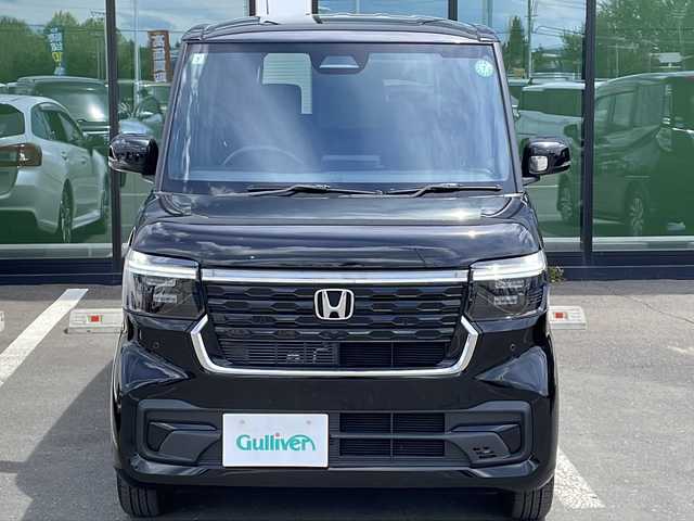 ホンダ Ｎ ＢＯＸ カスタム 道東・釧路十勝 2024(令6)年 1.1万km クリスタルブラックパール ・4WD/・社外SDナビ/（SD・FM・AM・AUX・BT・SMART USEN・DISC）/・バックカメラ/・ホンダセンシング/・レーダークルーズコントロール/・レーンキープアシスト/・コーナーセンサー/・片側パワースライドドア/・前席シートヒーター/・ミラーヒーター/・ETC/・電子制御パーキング/・ステアリングスイッチ/・LEDヘッドライト/・オートライト/・ヘッドライトレベライザー/・横滑り防止/・電格ウィンカーミラー/・スマートキー/・プッシュスタート