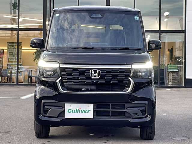 ホンダ Ｎ ＢＯＸ カスタム 青森県 2024(令6)年 1.1万km クリスタルブラックパール ・4WD/・社外SDナビ/（SD・FM・AM・AUX・BT・SMART USEN・DISC）/・バックカメラ/・ホンダセンシング/・レーダークルーズコントロール/・レーンキープアシスト/・コーナーセンサー/・片側パワースライドドア/・前席シートヒーター/・ミラーヒーター/・ETC/・電子制御パーキング/・ステアリングスイッチ/・LEDヘッドライト/・オートライト/・ヘッドライトレベライザー/・横滑り防止/・電格ウィンカーミラー/・スマートキー/・プッシュスタート