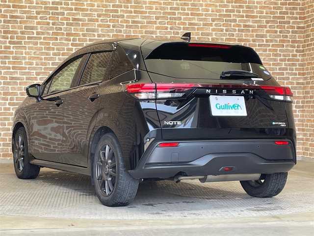 日産 ノート X FOUR 新潟県 2021(令3)年 3.8万km スーパーブラック ４WD/プロパイロット/アラウンドビューモニター/寒冷地仕様/全方位運転支援システム/エマージェンシーブレーキ/レーンアシスト/踏み間違い衝突防止アシスト/オートハイビーム/横滑り防止装置/インテリジェントルームミラー/ワイヤレス充電器/コーナーセンサー/シートヒーター/ステアリングヒーター/LEDヘッドライト/社外１６インチアルミホイール