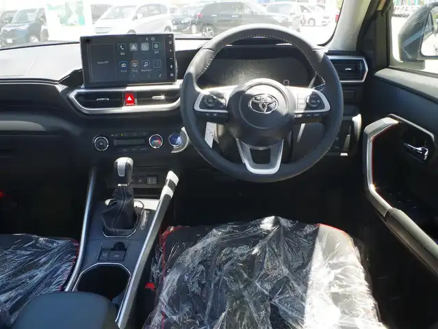 トヨタ ライズ Z 千葉県 2025(令7)年 0.1万km未満 ナチュラルベージュマイカM HEV Z　ディスプレイオーディオパッケーシ（97900）/スマートアシストIII/レーダークルーズコントロール/エコアイドル/スマートペダル/ディスプレイオーディオ/純正地デジTV/【Apple CarPlay　Android Auto対応】/【Bluetooth接続】/バックカメラ/前席シートヒーター/革巻きステアリング/ステアリングスイッチ/LEDヘッドライト/フォグライト/ウインカーミラー/コーナーセンサー/純正17インチアルミホイル/サイド/カーテンエアバッグ/キーフリーシステム