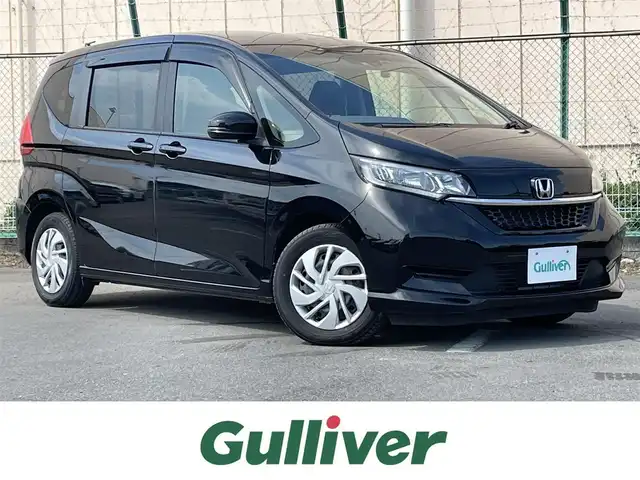 ホンダ フリード G ホンダセンシング 東京都 2022(令4)年 2.4万km クリスタルブラックパール ケンウッドナビ/バックモニター/衝突軽減ブレーキ/路外逸脱抑制機能/車線維持支援/アダプティブクルーズコントロール/シートヒーター/両側パワースライドドア/ＥＴＣ/ドライブレコーダー/スマートキー