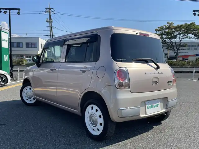 スズキ ラパン ショコラ G 鳥取県 2014(平26)年 7万km シャンパンピンクPM 社外ナビ/ワンセグ/CD/ETC/ショコラ専用レザーシート/ショコラ専用革巻きハンドル/キセノンヘットライト/純正14インチホワイトアルミ/プッシュエンジンスタート/アイドリングストップ/電動格納ミラー/スマートキー/フロアマット/ドアバイザー