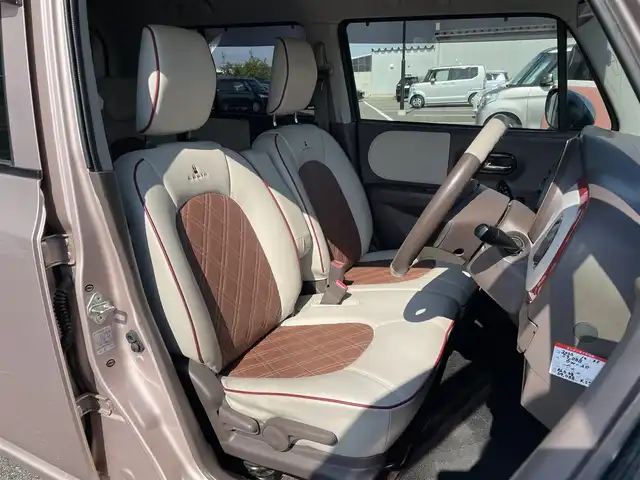 スズキ ラパン ショコラ G 鳥取県 2014(平26)年 7万km シャンパンピンクPM 社外ナビ/ワンセグ/CD/ETC/ショコラ専用レザーシート/ショコラ専用革巻きハンドル/キセノンヘットライト/純正14インチホワイトアルミ/プッシュエンジンスタート/アイドリングストップ/電動格納ミラー/スマートキー/フロアマット/ドアバイザー