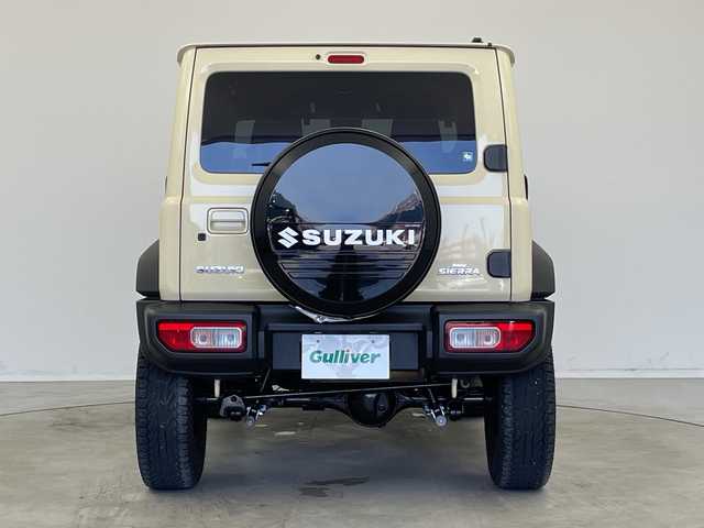 スズキ ジムニー シエラ JL 新潟県 2019(平31)年 1.9万km シフォンアイボリーM 4WD/社外SDナビ（型式：PVH-9300DVSZS）/・CD/DVD/Bluetooth/フルセグ/USB/ETC/前席シートヒーター/グリルガード/背面タイヤ/リヤタイヤカバー/純正LEDヘッドライト/オートライト/フロントフォグランプ/純正フロアマット/純正15インチAW夏タイヤ/ABS/盗難防止装置/センターデフロック/ダウンヒルアシストコントロール