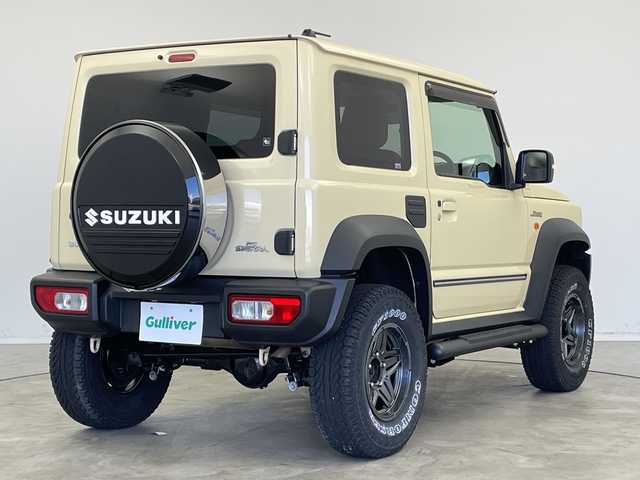 スズキ ジムニー シエラ JL 新潟県 2019(平31)年 1.9万km シフォンアイボリーM 4WD/社外SDナビ（型式：PVH-9300DVSZS）/・CD/DVD/Bluetooth/フルセグ/USB/ETC/前席シートヒーター/グリルガード/背面タイヤ/リヤタイヤカバー/純正LEDヘッドライト/オートライト/フロントフォグランプ/純正フロアマット/純正15インチAW夏タイヤ/ABS/盗難防止装置/センターデフロック/ダウンヒルアシストコントロール