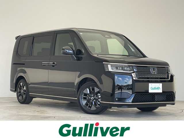 ホンダ ステップワゴン スパーダ eHEV 愛知県 2025(令7)年 0.1千km クリスタルブラックパール 登録済未使用車/純正11.4型SDナビ/両側パワースライドドア/レーダークルーズコントロール/バックカメラ/コーナーセンサー/純正アルミホイール/ブラインドスポットモニター/LEDヘッドライト/パドルシフト/リアオートエアコン/オートマチックハイビーム/衝突軽減システム/フルセグ/CD/DVD/Bluetooth/ステアリングスイッチ/スマートキー/プッシュスタート