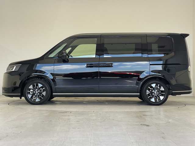 ホンダ ステップワゴン スパーダ eHEV 愛知県 2025(令7)年 0.1千km クリスタルブラックパール 登録済未使用車/純正11.4型SDナビ/両側パワースライドドア/レーダークルーズコントロール/バックカメラ/コーナーセンサー/純正アルミホイール/ブラインドスポットモニター/LEDヘッドライト/パドルシフト/リアオートエアコン/オートマチックハイビーム/衝突軽減システム/フルセグ/CD/DVD/Bluetooth/ステアリングスイッチ/スマートキー/プッシュスタート