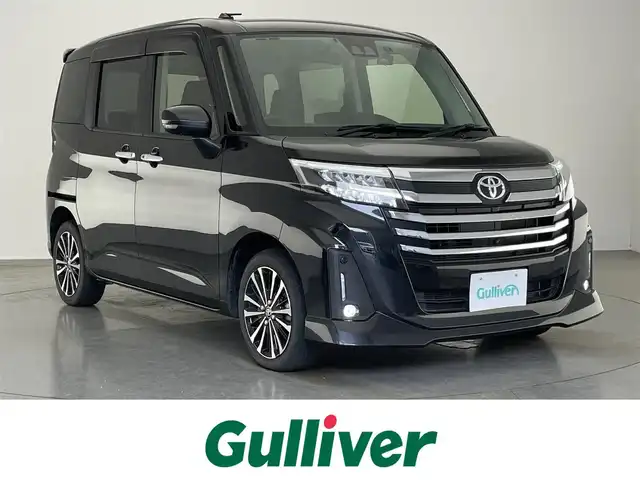 トヨタ ルーミー カスタムG－T 愛知県 2021(令3)年 2.5万km ブラックマイカメタリック 純正９型ナビ　全方位カメラ　両側パワスラ　スマートアシスト　シートヒーター　ＥＴＣ２．０　追従クルコン　ドラレコ　ＤＶＤ再生　衝突軽減　アイドリングストップ　ＬＥＤオートライト　フォグ　スマートキー プッシュスタート　電子パーキング　ブレーキサポート　純正フロアマット　純正アルミホイール　