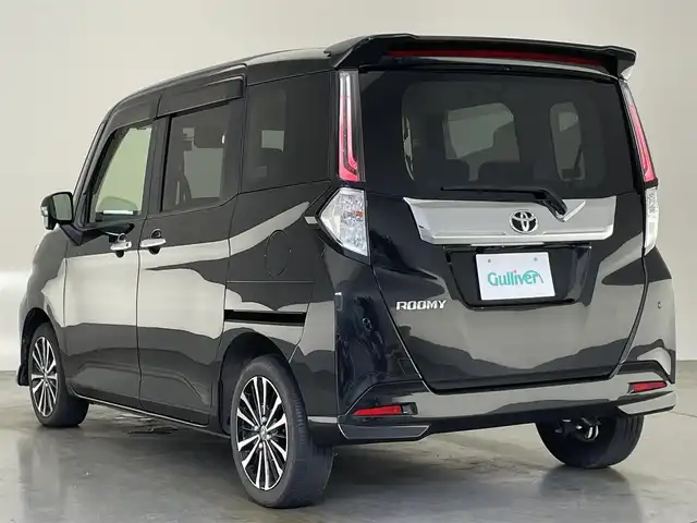 トヨタ ルーミー カスタムG－T 愛知県 2021(令3)年 2.5万km ブラックマイカメタリック 純正９型ナビ　全方位カメラ　両側パワスラ　スマートアシスト　シートヒーター　ＥＴＣ２．０　追従クルコン　ドラレコ　ＤＶＤ再生　衝突軽減　アイドリングストップ　ＬＥＤオートライト　フォグ　スマートキー プッシュスタート　電子パーキング　ブレーキサポート　純正フロアマット　純正アルミホイール　