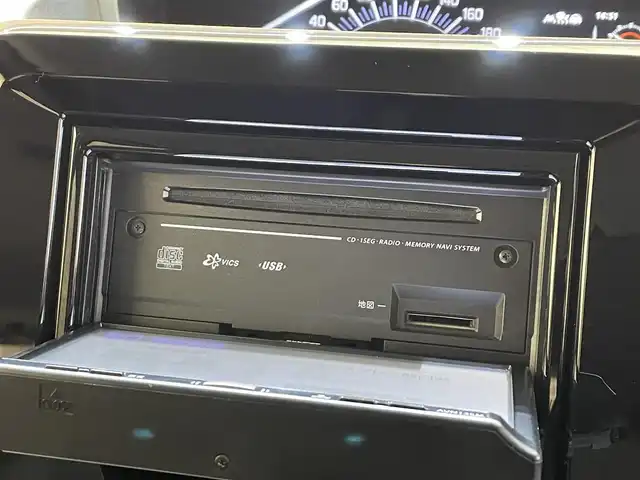 スズキ ソリオ HV MG 岩手県 2025(令7)年 1.6万km スターシルバーメタリック ４WD/スズキセーフティサポート/デュアルセンサーブレーキサポート２/車線逸脱抑制機能/アダプティブクルーズコントロール/車線維持支援機能/標識認識機能/先行車・青信号発信お知らせ/誤発進抑制機能/低速時ブレーキアシスト/パーキングセンサー/横滑り防止装置/アイドリングストップ/オートライト/ヘッドライトレベライザー/助手席アンダーボックス/社外ナビ/ワンセグTV/15インチスチールホイール/純正ホイールキャップ