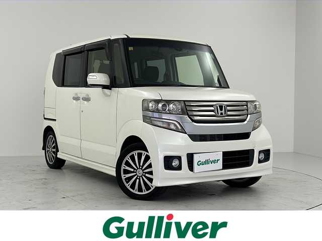 ホンダ Ｎ ＢＯＸ カスタム ターボ SSパッケージ 大阪府 2014(平26)年 4.4万km プレミアムホワイトパール 両側電動スライドドア/クルーズコントロール/パドルシフト/純正８インチナビ/フルセグTV/Bluetooth/パドルシフト/ステアリングスイッチ/電動格納ミラー/LEDヘッドライト/バックカメラ/アイドリングストップ
