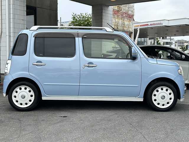 ダイハツ ミラ ココア プラスG 京都府 2012(平24)年 6.4万km ミストブルーマイカメタリック ワンオーナー/純正メモリナビ(01999-B2239)/ワンセグTV/FM/AM/CD.AUX/布系シートカバー(ブルー)/ルーフレール/バックカメラ/ヘッドライトレベライザー/アイドリングストップ/ベンチシート/ハロゲンライト/スマートキー/保証書/取扱説明書/点検記録簿