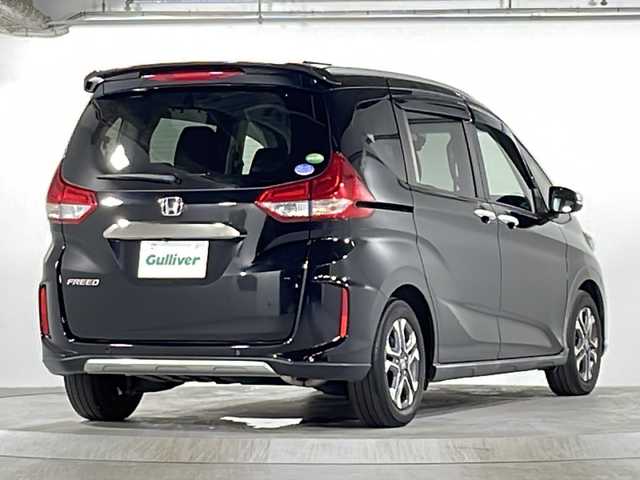 ホンダ フリード クロスター ホンダセンシング 広島県 2021(令3)年 3.4万km クリスタルブラックパール ホンダセンシング/・レーンキープアシスト/・オートハイビーム/純正9型SDナビ/・フルセグTV/・CD DVD /・Bluetooth/バックカメラ/両側パワースライドドア/ハーフレザーシート/前席シートヒーター/ドライブレコーダー/ETC/スマートキー/プッシュスタート/革巻きステアリング/ステアリングリモコン/純正フロアマット/社外ドアバイザー