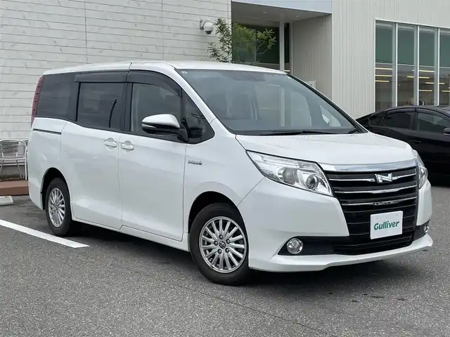 トヨタ ノア ハイブリッド G 石川県 2015(平27)年 4.6万km ホワイトパールクリスタルシャイン 純正メモリーナビ/CD/DVD/フルセグTV/バックカメラ/LEDヘッドライト/両側パワースライドドア/ETC/シートヒーター/クルーズコントロール/シートヒーター/オートエアコン/純正アルミホイール/オートライト/保証書