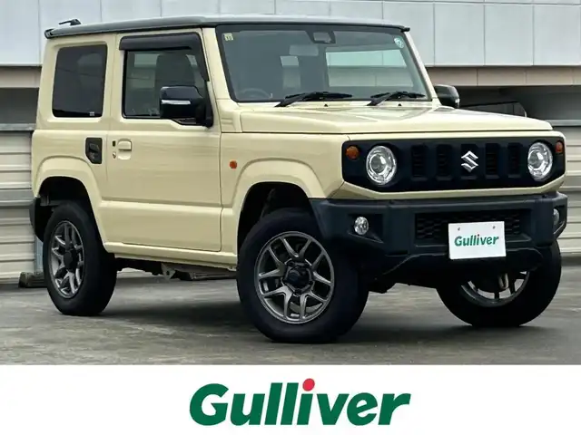 スズキ ジムニー XC 静岡県 2018(平30)年 5万km シフォンアイボリーメタリックブラック2トーンルーフ 純正ディスプレイオーディオ/（CD/DVD/Bluetooth/USB/BT）/セーフティサポート/・デュアルセンサーブレーキサポート/・誤発進抑制機能/・車線逸脱警報機能/クルーズコントロール/LEDヘッドランプ/オートライト/社外16インチアルミ/４WD/革巻きステアリングホイール/ステアリングスイッチ/前席シートヒーター/ダウンヒルアシストコントロール/スペアキー/キーレスプッシュスタートシステム