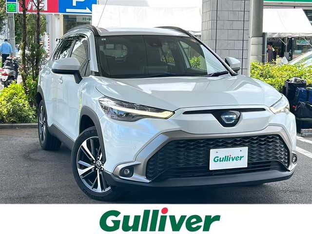 トヨタ カローラ クロス Z 東京都 2021(令3)年 1.5万km プラチナホワイトパールマイカ 純正HDDナビゲーション/フルセグテレビ/ハイブリッド車両/WAC/クルーズコントロール/USB端子/１００V充電/ETC2.0/パワーシート/プッシュスタート/純正フロアマット/純正アルミホイール/ABS/横滑り防止装置/コーナーセンサー/レーンキープアシスト/盗難防止装置/オートライト/LEDヘッドライト/保証書/取扱説明書/記録簿