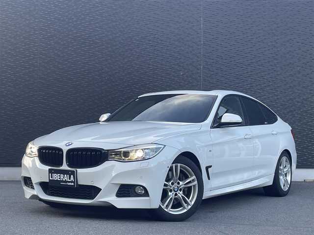 ＢＭＷ ３３５ｉ グランツーリスモ Mスポーツ 大分県 2014(平26)年 8.5万km アルピンホワイトⅢ 保証書/取扱説明書/純正ナビ/Bluetooth/バックカメラ/USB/サンルーフ/フルレザーシート/パワーシート（D席/N席）/シートヒーター（D席/N席）/電動格納ミラー/アンビエントライト/電動リアゲート/純正フロアマット有/純正18インチアルミホイール
