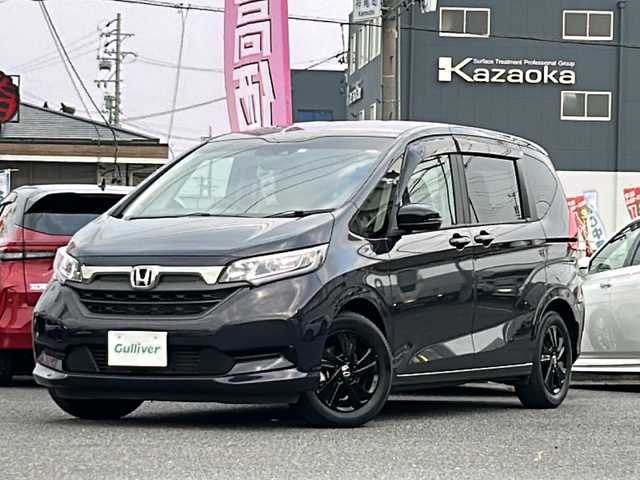 ホンダ フリード G ブラックスタイル 愛知県 2023(令5)年 3.3万km トワイライトミストブラックパール /禁煙/ワンオーナー/ディーラー整備記録簿R5.6.7//純正ナビ/フルセグTV/BT/USB/CD/DVD//TVキャンセラー/バックカメラ/ETC//純正前後ドライブレコーダー(DRH-204VD)//両側パワースライドドア//アイドリングストップ//LEDヘッドランプ/オートライト/オートハイビーム//ACC/LKAS/CMBS/RSA//電動格納ウィンカーミラー//純正15インチAW//シートリフト//ECON//ステアリングスイッチ//純正フロアマット//純正ドアバイザー//保証書//取扱説明書//スペアスマートキー有