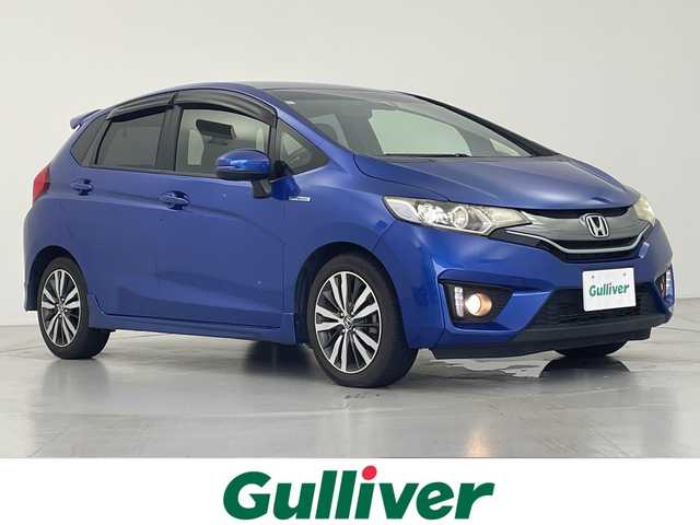 ホンダ フィット ハイブリット Sパッケージ 愛知県 2013(平25)年 5万km ブリリアントスポーティブルーメタリック2トーン Gathersナビ【CD/DVD/Bluetooth】/ワンセグテレビ/バックカメラ/クルーズコントロール/プッシュスタート/LEDヘッドライト/フォグランプ/オートライト/スペアキー/ドアバイザー/ウィンカーミラー/ドライブレコーダー/ビルトインETC/純正AW