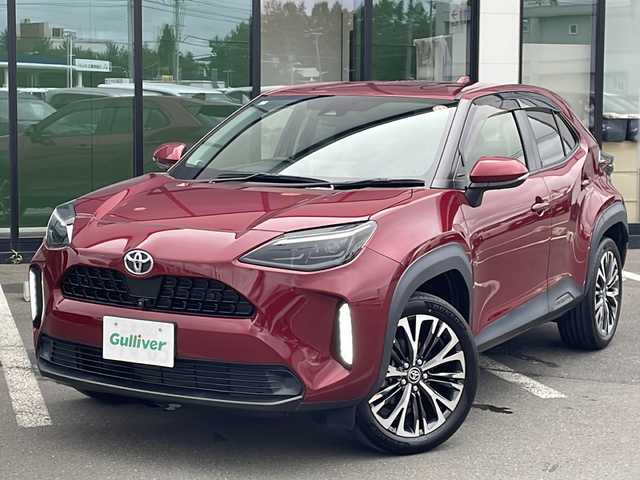 トヨタ ヤリスクロス Z 道東・釧路十勝 2020(令2)年 2.3万km センシュアルレッドマイカ ・４WD/・純正ディスプレイオーディオ/（BT・AM・FM・Miracast）/・パノラミックビューモニター/・ETC2.0/・レーダークルーズコントロール/・トヨタセーフティセンス/・レーンキープアシスト/・車線逸脱防止機能/・衝突被害軽減ブレーキ/・本革ステアリング/・電動リアゲート/・ステアリングヒーター/・オートハイビーム/・前席シートヒーター/・ダウンヒルアシスト/・USBチャージャー/・横滑り防止装置/・オートブレーキホールド/・パワーシート/・コーナーセンサー前後/・純正フロアマット/・ドアバイザー/・純正18インチアルミホイール/・LEDヘッドライト/・フロントフォグライト/・ハーフレザーシート/・保証書/・取扱説明書