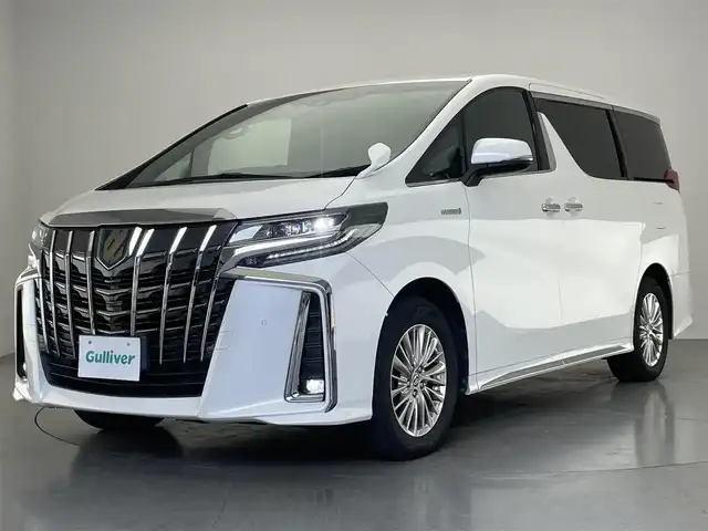 トヨタ アルファードハイブリット S タイプゴールド 愛知県 2021(令3)年 3.5万km ホワイトパールクリスタルシャイン 純正９型ナビ　ＢＳＭ　デジタルインナーミラー　両側パワスラ　追従クルコン　セーフティセンス　フルセグ　ＢＴ　ＥＴＣ　バックカメラ　車線逸脱　衝突軽減　ＬＥＤライト　コーナーセンサー　ＡＣ１００Ｖ電源　電動リアゲート　オットマン　