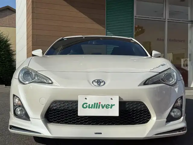 トヨタ ８６ GT リミテッド 香川県 2014(平26)年 8.6万km サテンホワイトパール 純正SDナビ/フルセグ/CD/DVD/Bluetooth/バックカメラ/モデリスタエアロ/weds18インチアルミ/キセノンヘッドライト/ドライブレコーダー/ハーフレザーシート/シートヒーター/スマートキー/純正マット/ETC