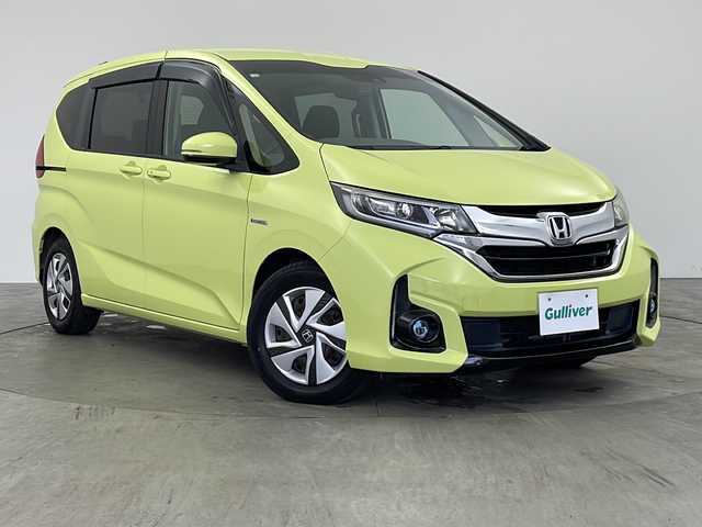 ホンダ フリード ハイブリット G ホンダセンシング 兵庫県 2016(平28)年 7.3万km シトロンドロップ ・純正ナビ（VXM-175VFNi）/・CD/DVD/BT/フルセグTV/・バックカメラ/・ホンダセンシング/・衝突軽減ブレーキ/・誤発進抑制機能/・アダプティブクルーズコントロール/・車線維持支援システム/・歩行者事故低減ステアリング/・路外逸脱抑制機能/・先行車発進お知らせ機能/・標識認識機能/・LEDヘッドライト/・オートライト/・フォグランプ/・コンフォートビューパッケージ/・Cパッケージ/・前後ドライブレコーダー（GL-03AP）/・純正フロアマット/・純正ドアバイザー/・プラズマクラスター/・サンシェード/・スマートキー/・スペアキー/・プッシュスタート