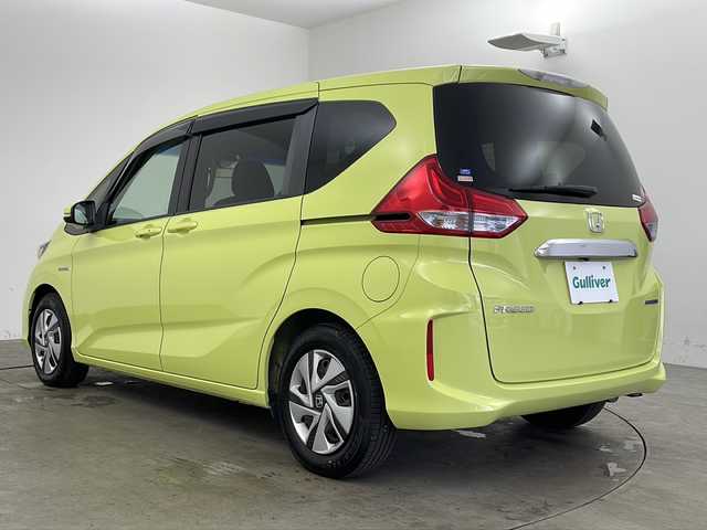 ホンダ フリード ハイブリット G ホンダセンシング 兵庫県 2016(平28)年 7.3万km シトロンドロップ ・純正ナビ（VXM-175VFNi）/・CD/DVD/BT/フルセグTV/・バックカメラ/・ホンダセンシング/・衝突軽減ブレーキ/・誤発進抑制機能/・アダプティブクルーズコントロール/・車線維持支援システム/・歩行者事故低減ステアリング/・路外逸脱抑制機能/・先行車発進お知らせ機能/・標識認識機能/・LEDヘッドライト/・オートライト/・フォグランプ/・コンフォートビューパッケージ/・Cパッケージ/・前後ドライブレコーダー（GL-03AP）/・純正フロアマット/・純正ドアバイザー/・プラズマクラスター/・サンシェード/・スマートキー/・スペアキー/・プッシュスタート