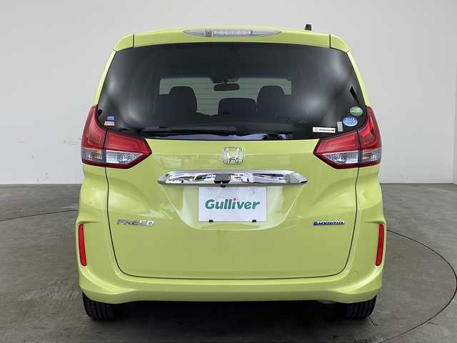 ホンダ フリード ハイブリット G ホンダセンシング 兵庫県 2016(平28)年 7.3万km シトロンドロップ ・純正ナビ（VXM-175VFNi）/・CD/DVD/BT/フルセグTV/・バックカメラ/・ホンダセンシング/・衝突軽減ブレーキ/・誤発進抑制機能/・アダプティブクルーズコントロール/・車線維持支援システム/・歩行者事故低減ステアリング/・路外逸脱抑制機能/・先行車発進お知らせ機能/・標識認識機能/・LEDヘッドライト/・オートライト/・フォグランプ/・コンフォートビューパッケージ/・Cパッケージ/・前後ドライブレコーダー（GL-03AP）/・純正フロアマット/・純正ドアバイザー/・プラズマクラスター/・サンシェード/・スマートキー/・スペアキー/・プッシュスタート