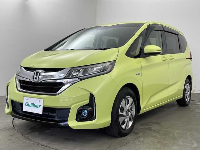 ホンダ フリード ハイブリット G ホンダセンシング 兵庫県 2016(平28)年 7.3万km シトロンドロップ ・純正ナビ（VXM-175VFNi）/・CD/DVD/BT/フルセグTV/・バックカメラ/・ホンダセンシング/・衝突軽減ブレーキ/・誤発進抑制機能/・アダプティブクルーズコントロール/・車線維持支援システム/・歩行者事故低減ステアリング/・路外逸脱抑制機能/・先行車発進お知らせ機能/・標識認識機能/・LEDヘッドライト/・オートライト/・フォグランプ/・コンフォートビューパッケージ/・Cパッケージ/・前後ドライブレコーダー（GL-03AP）/・純正フロアマット/・純正ドアバイザー/・プラズマクラスター/・サンシェード/・スマートキー/・スペアキー/・プッシュスタート