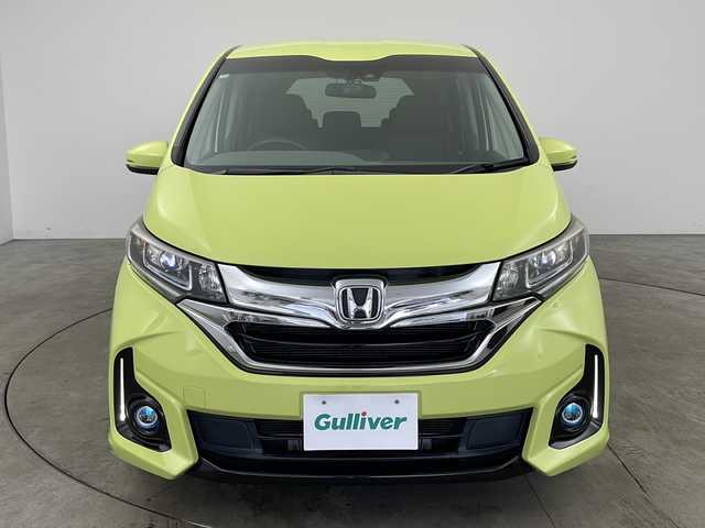 ホンダ フリード ハイブリット G ホンダセンシング 兵庫県 2016(平28)年 7.3万km シトロンドロップ ・純正ナビ（VXM-175VFNi）/・CD/DVD/BT/フルセグTV/・バックカメラ/・ホンダセンシング/・衝突軽減ブレーキ/・誤発進抑制機能/・アダプティブクルーズコントロール/・車線維持支援システム/・歩行者事故低減ステアリング/・路外逸脱抑制機能/・先行車発進お知らせ機能/・標識認識機能/・LEDヘッドライト/・オートライト/・フォグランプ/・コンフォートビューパッケージ/・Cパッケージ/・前後ドライブレコーダー（GL-03AP）/・純正フロアマット/・純正ドアバイザー/・プラズマクラスター/・サンシェード/・スマートキー/・スペアキー/・プッシュスタート