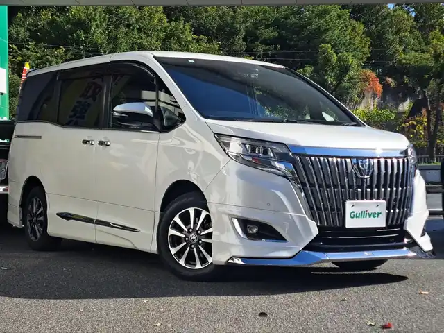 トヨタ エスクァイア Gi 大阪府 2021(令3)年 4.9万km ホワイトパールクリスタルシャイン /禁煙車//ワンオーナー車//MODELLISTAエアロ(F.S.R)//ディーラーOP9型SDナビ【NSZT-Y68T】/・フルTV/DVD/SD/CD/Bluetooth//バックカメラ//純正12.1型フリップダウンモニター【V12-R68C】//両側パワースライドドア//衝突軽減ブレーキ//オートハイビーム//レーンキープアシスト//クルーズコントロール//前席シートヒーター//前後ドラレコ【ZDR-015】//ビルトインETC//純正15AW//バックドアイージークローザー//保証書//取扱説明書//スペアキー