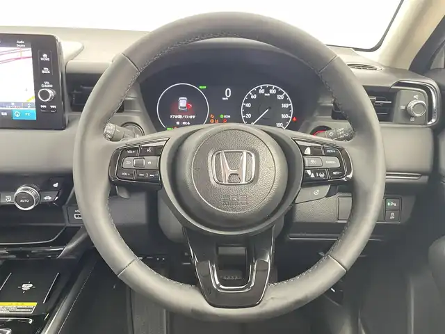 ホンダ ヴェゼル ハイブリッド e:HEV Z 千葉県 2025(令7)年 0.1千km プラチナホワイトパール 登録済未使用車　/登録時走行距離：5km/純正ホンダコネクトナビ　/AM＆FM＆Bluetooth＆フルセグTV/ホンダセンシング　/レーダークルーズコントロール　/踏み間違い衝突軽減システム　/ブラインドスポットモニター/シートヒーター　/電動トランク　/ダウンヒルアシスト　/ビルトインＥＴＣ2.0/ワイヤレス充電/電動格納サイドミラー/電動パーキングブレーキ/オートホールド/Driveモード/前後コーナーセンサー/LEDヘッドライト（オートライト機能付き）/フォグランプ/トノカバー/USBポート/アイドリングストップ/ウィンカーミラー/プッシュスタート