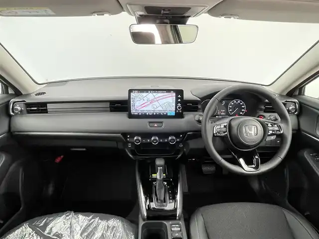 ホンダ ヴェゼル ハイブリッド e:HEV Z 千葉県 2025(令7)年 0.1千km プラチナホワイトパール 登録済未使用車　/登録時走行距離：5km/純正ホンダコネクトナビ　/AM＆FM＆Bluetooth＆フルセグTV/ホンダセンシング　/レーダークルーズコントロール　/踏み間違い衝突軽減システム　/ブラインドスポットモニター/シートヒーター　/電動トランク　/ダウンヒルアシスト　/ビルトインＥＴＣ2.0/ワイヤレス充電/電動格納サイドミラー/電動パーキングブレーキ/オートホールド/Driveモード/前後コーナーセンサー/LEDヘッドライト（オートライト機能付き）/フォグランプ/トノカバー/USBポート/アイドリングストップ/ウィンカーミラー/プッシュスタート