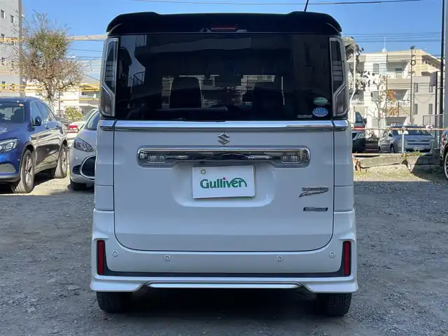 スズキ スペーシア カスタム HYBRID XS ターボ 東京都 2018(平30)年 4.1万km ピュアホワイトパール/ブラック2トーン ターボ/社外メモリナビ(CN-RZ743W)/　(フルセグTV/Bluetooth/DVD/SD/USB)/バックカメラ/ETC/前後ドライブレコーダー/両側パワースライドドア/ハーフレザーシート/D席シートヒーター/レザー調シートカバー/クルーズコントロール/スズキ セーフティ サポート/・デュアルセンサーブレーキサポート/・車線逸脱警報機能/・先行車発進お知らせ機能/・後退時ブレーキサポート/・リヤパーキングセンサー/・誤発進抑制機能/・ふらつき警報機能/・ハイビームアシスト/・後方誤発進抑制機能/横滑り防止装置/パドルシフト/スマートキー/社外14インチアルミホイール/(純正15インチアルミ車載)/純正LEDヘッドライト/カーテンエアバック/スペアキー1本/保証書/取扱説明書