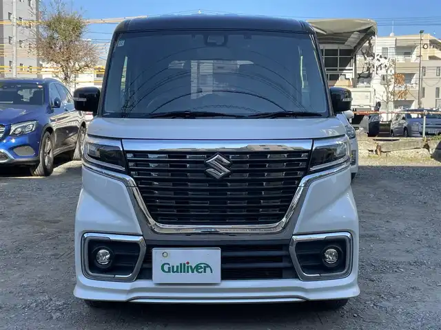 スズキ スペーシア カスタム HYBRID XS ターボ 東京都 2018(平30)年 4.1万km ピュアホワイトパール/ブラック2トーン ターボ/社外メモリナビ(CN-RZ743W)/　(フルセグTV/Bluetooth/DVD/SD/USB)/バックカメラ/ETC/前後ドライブレコーダー/両側パワースライドドア/ハーフレザーシート/D席シートヒーター/レザー調シートカバー/クルーズコントロール/スズキ セーフティ サポート/・デュアルセンサーブレーキサポート/・車線逸脱警報機能/・先行車発進お知らせ機能/・後退時ブレーキサポート/・リヤパーキングセンサー/・誤発進抑制機能/・ふらつき警報機能/・ハイビームアシスト/・後方誤発進抑制機能/横滑り防止装置/パドルシフト/スマートキー/社外14インチアルミホイール/(純正15インチアルミ車載)/純正LEDヘッドライト/カーテンエアバック/スペアキー1本/保証書/取扱説明書