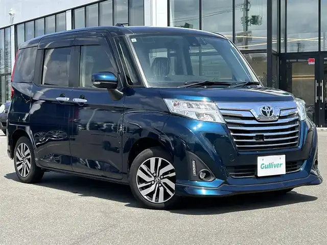 トヨタ ルーミー カスタムG S 青森県 2017(平29)年 4.2万km ブラックマイカメタリック/レーザーブルークリスタルシャイン 2トーン ・4WD/・寒冷地仕様/・純正ナビ/・CD/SD/Bluetooth/・フルセグ/・リアカメラ/・ビルドインETC/・ワイパーデアイサー/・衝突被害軽減ブレーキ/・車線逸脱警報機能/・クルーズコントロール（追従無し）/・横滑り防止/・両側パワースライドドア/・ステアリングリモコン/・アイドリングストップ/・プッシュスタート/・スマートキー/・ワイパーデアイサー/・純正AW14インチ