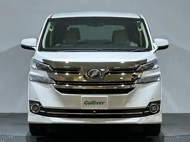 トヨタ ヴェルファイア V 愛媛県 2017(平29)年 6万km ホワイトパールクリスタルシャイン 純正ナビ/(AM/FM/CD/DVD/フルセグ/Bluetooth)/バックカメラ/純正フリップダウンモニター/両側パワースライドドア/クルーズコントロール/運転席パワーシート/シートメモリー/衝突被害軽減ブレーキ/純正ドライブレコーダー/ビルトインＥＴＣ　/ステアリングリモコン/ＬＥＤヘッドライト/オットマン/キャプテンシート/取扱説明書