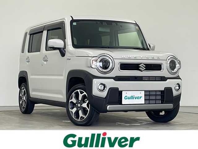 スズキ ハスラー HYBRID X ターボ 秋田県 2025(令7)年 0.4万km ソフトベージュメタリック 純正ナビ【AM/FM/BT/CD/DVD】 /USBポート/全方位カメラ /フルセグTV /ETC パドルシフト　/前後ドライブレコーダー　/アダプティブクルーズコントロール　/前席シートヒーター　/スズキセーフティサポート/車線逸脱警報/横滑り防止装置/衝突被害軽減システム/クリアランスソナー/オートライト　/オートエアコン  /ダウンヒルアシストコントロール/ヒルディセントコントロール/PWR/プッシュスタート /スマートキー/スペアキー有り/ステアリングリモコン/アイドリングストップ/革巻きステアリング/社外フロアマット/ウィンカーミラー /フォグライト /サイドバイザー /取扱説明書