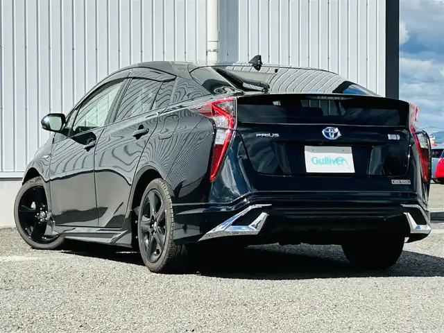 トヨタ プリウス Sツーリングセレクション 熊本県 2019(平31)年 5.2万km アティチュードブラックマイカ 純正ナビ/・AM/FM/CD/DVD/SD/iPod/BT/・フルセグTV/バックカメラ/トヨタセーフティセンス/・レーンディパーチャーアラート/・プリクラッシュセーフティ/・ふらつき警報/・車両接近通報装置/・オートマチックハイビーム/・レーダークルーズコントロール/革巻きステアリング/・ステアリングリモコン/レザーシート/・D/N席シートヒーター/MODELISTAエアロ（フロント/サイド/リア）/前後ドライブレコーダー【ZDR035】/オートライト/・LEDライト/・フォグランプ/ビルトインETC/電動格納ミラー/・ウィンカーミラー/トノカバー/純正ドアバイザー/純正アルミホイール/純正フロアマット/スマートキー