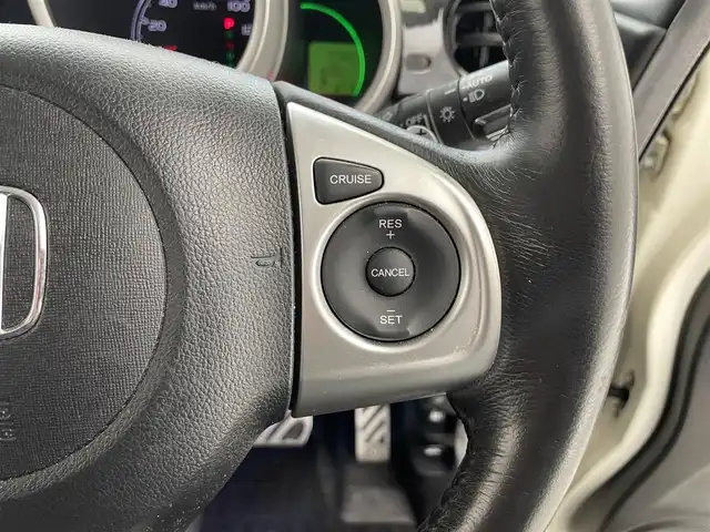 ホンダ Ｎ ＢＯＸ 2トーン G ターボ Lパッケージ 滋賀県 2015(平27)年 7.4万km プレミアムホワイトパールⅡ 社外8インチナビ/（CD/DVD/BT/フルセグTV）/バックカメラ/後席フリップダウンモニター/D/Nシートヒーター/ベンチシート/フルフラットシート/チップアップシート/両側パワースライドドア/レーダークルーズコントロール/コーナーセンサー/レーンキープアシスト/衝突被害軽減ブレーキ/LEDヘッドライト/オートライト/スマートキー/ETC