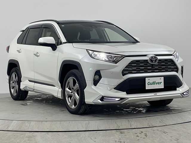 トヨタ ＲＡＶ４ G 熊本県 2021(令3)年 3.3万km ホワイトパールクリスタルシャイン 純正ディスプレイオーディオ　/Ｂｌｕｅｔｏｏｔｈ　/全方位モニター　/ビルトインＥＴＣ　/前後ドライブレコーダー　/ステアリングヒーター　/メモリーシート　/サンルーフ　/シートヒーター　/モデリスタエアロ