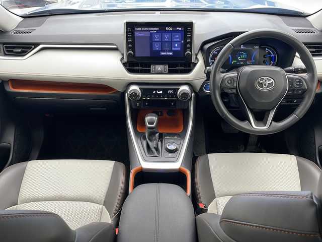 トヨタ ＲＡＶ４ ハイブリッド アドベンチャー 沖縄県 2022(令4)年 8.5万km アッシュグレーメタリック/グレイッシュブルー 純正ディスプレイオーディオ/　（Bluetooth/フルセグTV/AM/FM）/パノラマルーフ/ドライブレコーダー/ETC2.0/パノラミックビューモニター/トヨタセーフティセンス/・衝突被害軽減ブレーキ (プリクラッシュセーフティ)																									/・ハンドル操作サポート (レーントレーシングアシスト)																									/・追従ドライブ支援機能 (レーダークルーズコントロール)																									/・車線はみ出しアラート (レーンディパーチャーアラート)																									/・自動ハイビーム (オートマチックハイビーム)																									/ブラインドスポットモニター/電動リアゲート/レザーシート/メモリ付パワーシート/シートエアコン/シートヒーター/電動サイドブレーキ/ステアリングヒーター/オートハイビーム/クリアランスソナー/LEDヘッドライト/オートライト/スマートキー/スペアキー/プッシュスタート/純正フロアマット/純正19インチアルミホイール