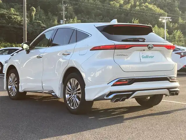 トヨタ ハリアー Z レザーパッケージ 佐賀県 2020(令2)年 4.1万km ホワイトパールクリスタルシャイン モデリスタエアロ/調光パノラマルーフ/純正12.3インチナビ/JBLサウンドシステム/パノラマミックビューモニター/プリクラッシュセーフティ/レーンディパーチャーアラート/オートハイビーム/アダプティブクルーズコントロール/クリアランスソナー/ブラインドスポットモニター/リアクロストラフィックアラート/ヘッドアップディスプレイ/スマートルームミラー（前方録画機能付き）/レザーシート/メモリパワーシートシート/シートヒーター/エアシート/パワーバックドア/電動パーキングブレーキ/オートブレーキホールド/ステアリングヒーター/ステアリングスイッチ/ETC/プッシュスタート/スマートキー/LEDヘッドライト/フォグライト/純正アルミホイール