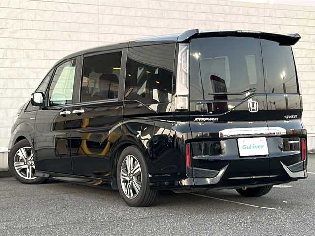 ホンダ ステップワゴン スパーダ ハイブリッド G EX ホンダセンシング 茨城県 2018(平30)年 5万km プレミアムスパークルブラックパール 純正10インチプレミアムインターナビ/(地デジTV・CD・DVD・BT・USB・ラジオ再生)/後席フリップダウンモニター/両側パワースライドドア/わくわくゲート/HONDA SENSING/・アダプティブクルーズコントロール/・衝突軽減ブレーキ/・車線維持支援システム/・誤発進抑制機能/・先行車発進お知らせ機能/・オートハイビーム/・標識認識機能コーナーセンサー/ハーフレザーシート/シートヒーター/バックカメラ/ドライブレコーダー/ビルトインETC/オートライト/LEDヘッドライト/純正16inアルミホイール/純正フロアマット/スマートキー/スペアキー/取扱説明書/保証書