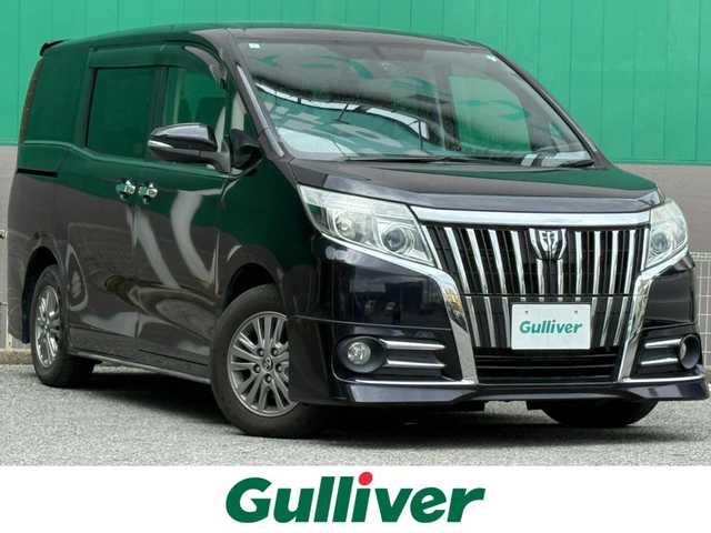 トヨタ エスクァイア Gi 千葉県 2015(平27)年 3.6万km スパークリングブラックパールクリスタルシャイン 社外SDナビ/フルセグTV/CD/DVD/Bluetooth/フリップダウンモニター/クルーズコントロール/両側パワースライドドア/ETC/バックカメラ/レザーシート/D/N席シートヒーター/オートハイビーム/LEDヘッドライト/スマートキー/プッシュスタート/純正15インチAW