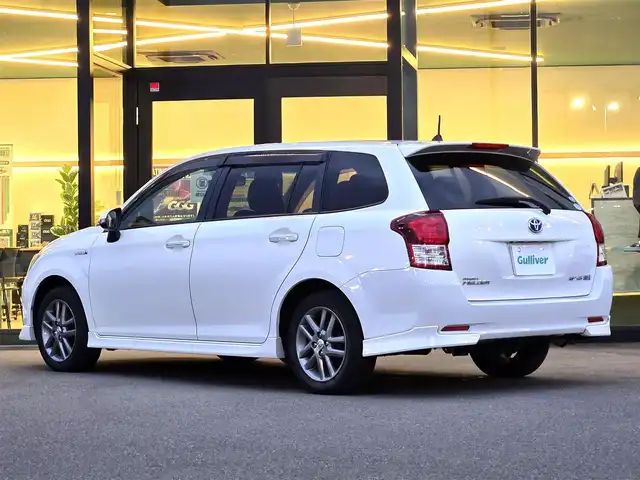 トヨタ カローラ フィールダー HV G エアロツアラー W×B 東京都 2015(平27)年 9.4万km ホワイトパールクリスタルシャイン 純正７インチナビ（NSZT-W64）　/・Bluetooth接続/・ワンセグTV/ドライブレコーダー/バックカメラ/純正フロアマット/純正15インチアルミホイール/ハーフレザーシート/AACエアコン（nanoe）/ドアバイザー/ETC