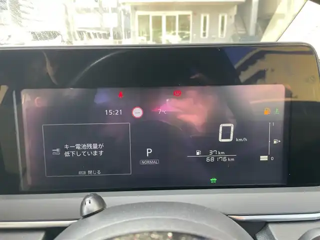 日産 ノート X FOUR 島根県 2023(令5)年 6.9万km ダークメタルグレー 4WD/社外メモリナビ　/(AM/FM/Ｂｌｕｅｔｏｏｔｈ接続)/前方ドライブレコーダー/ＥＴＣ　/バックカメラ　/インテリジェント　エマージェンシーブレーキ/レーンアシスト/後側方車両検知警報システム/前後コーナーセンサー/前席シートヒーター　/ステアリングヒーター/電動パーキングブレーキ/オートホールド　/オートハイビーム/ライト　/純正フロアマット/スペアキー1本